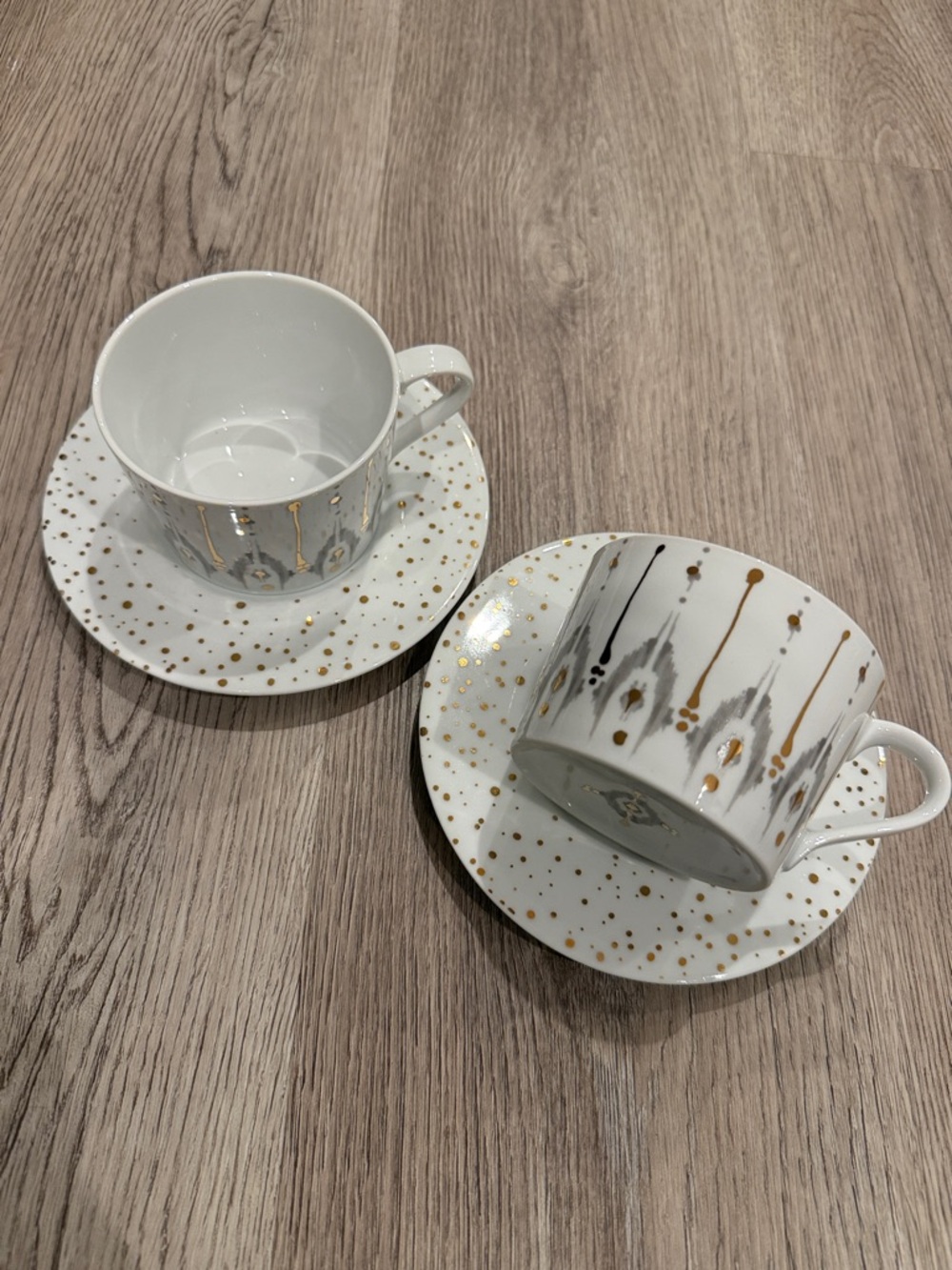 Anthropologie White Porcelain Teacup & Saucer Set with Gold Drip Detail